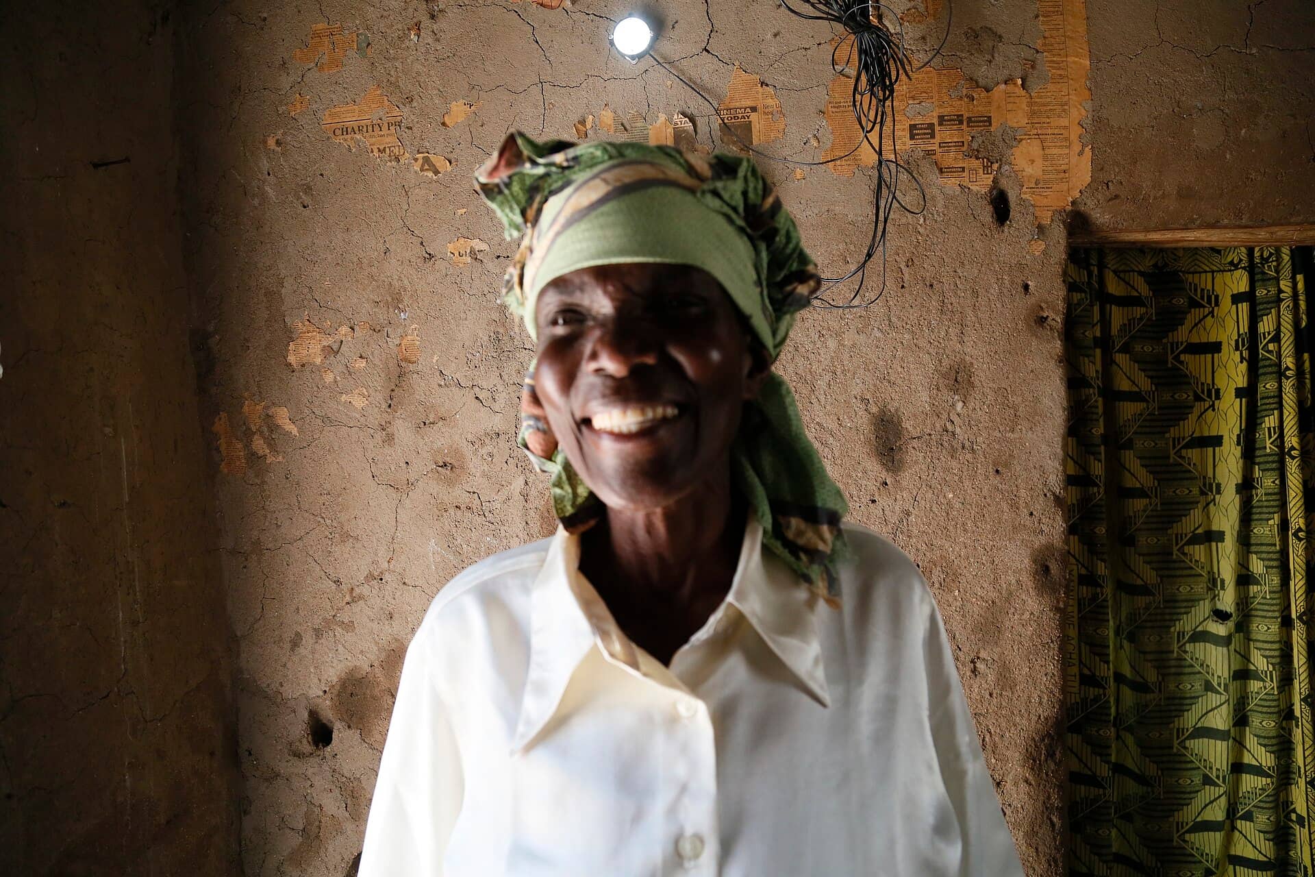 Elizabeth Mukwimba with pay-as-you-go solar in Tanzania